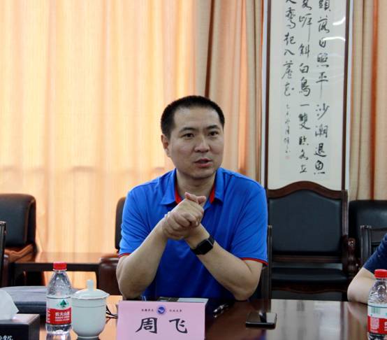 中国教育报总编辑周飞一行来校考察调研
