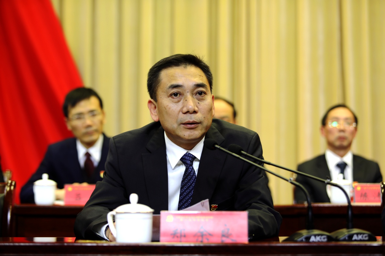 郑余良代表金华市委向大会召开表示祝贺.
